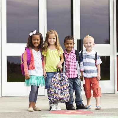 Photo of kids with backpacks